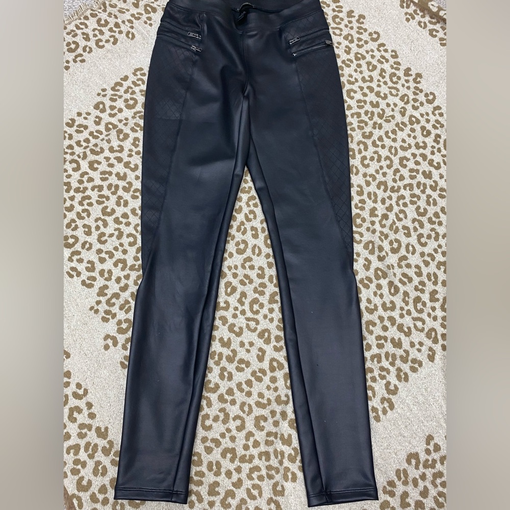 Faux leather skinny pants.
